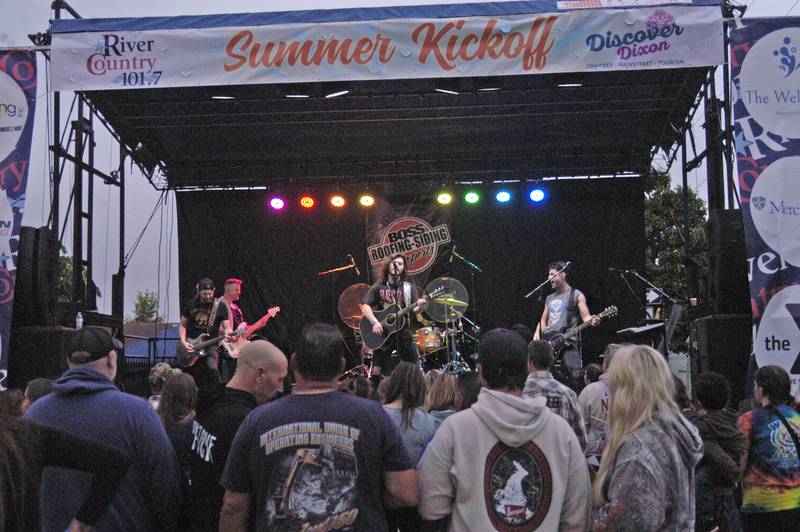 Chase McDaniel performs for the crowd  at  River Country 101.7's Summer Kickoff. The event was held on the Dixon Riverfront June 1, 2024.