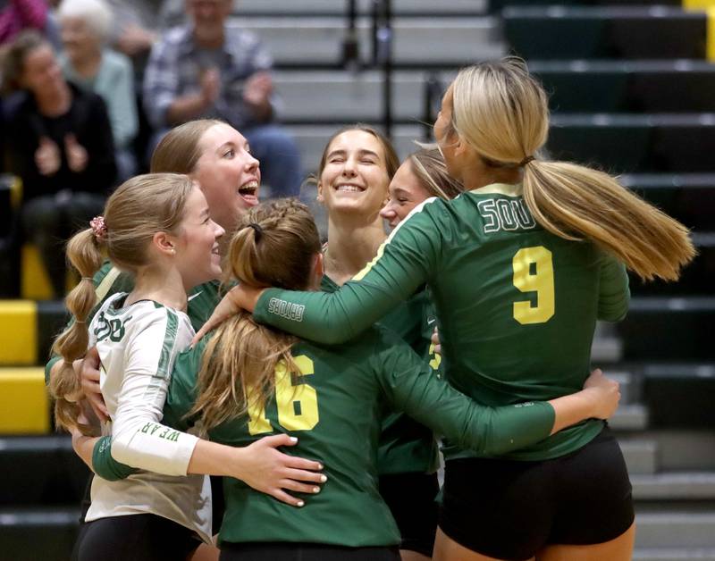 Crystal Lake South’s Gators celebrate a two-set win against Crystal Lake Central  in varsity volleyball at Crystal Lake South High School in Crystal Lake on Tuesday, Oct. 7, 2025.