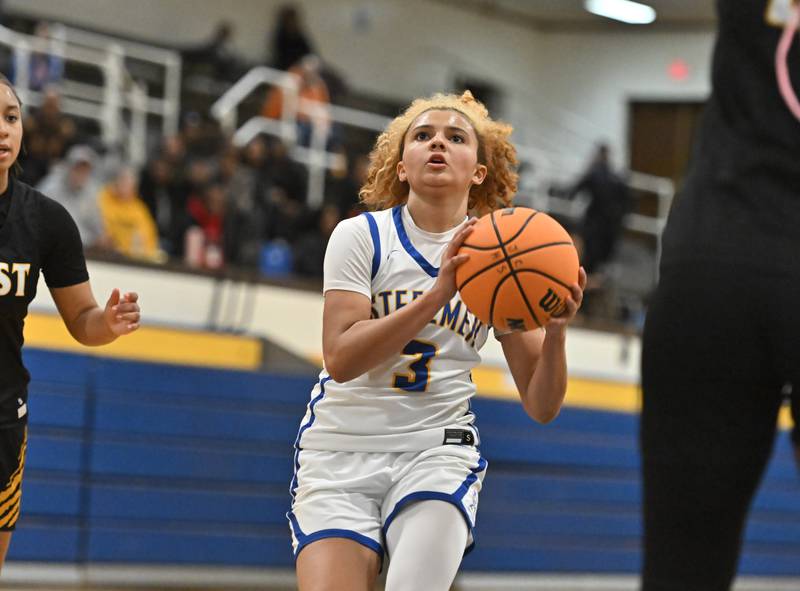 Joliet Central's Nevaeh Wright (3) drives to the basket during the non-conference basketball game against Joliet West on Monday, Dec 02, 2024 at Joliet.