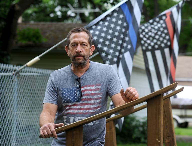 Rich Jankowski outside his home in Wonder Lake on Wednesday, June 1, 2022. Jankowski was awarded $3.3 million in 2019 when a jury found that Dean Foods retaliated against him by refusing to recall him back to work following an injury.