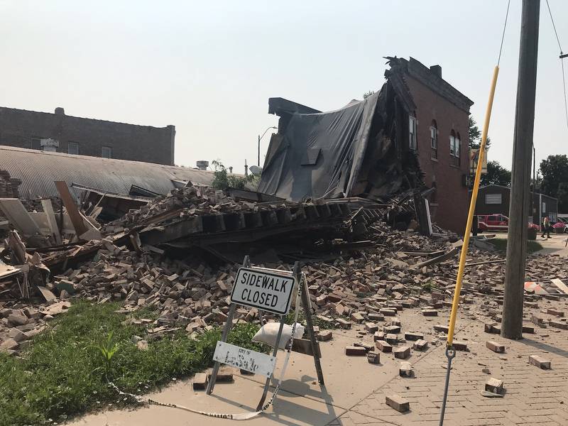 A long-time abandoned tavern at the corner of Tonti and First streets collapsed Monday morning.