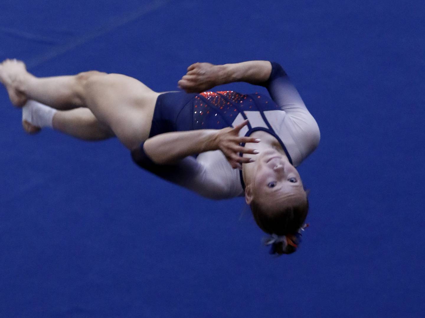 Oswego's Sam Phillips competes in the preliminary round of the floor exercise on Friday, Feb. 21, 2025, during the IHSA Girls State Final Gymnastics Meet at Palatine High School.