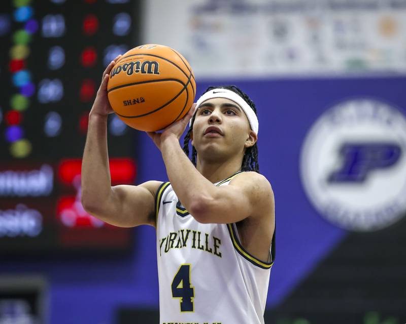 Yorkville Christian's Tray Alford (4) shoots a free throw during their Plano Christmas Classic semi-final basketball game between Yorkville Christian at Plano Monday, Dec 29, 2025 in Plano.