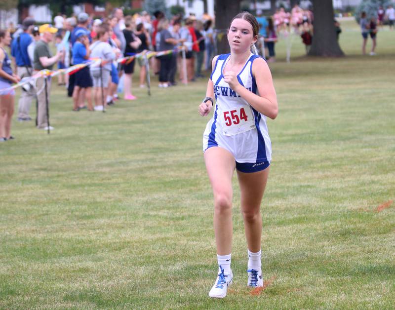 Newman's Grace King runs during the Gary Coates Invitational cross country meet on Saturday, Sept. 13, 2025 at Zearing Park in Princeton.