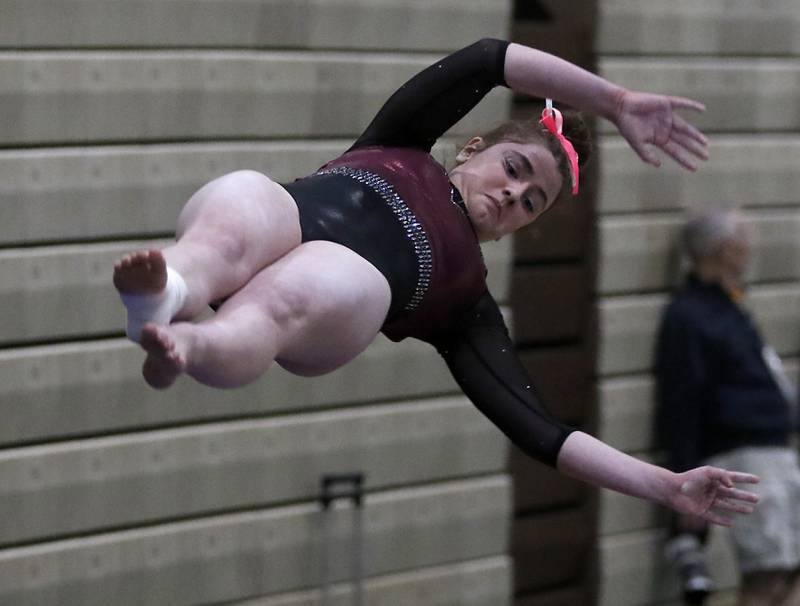 Prairie Ridge’s Delaney Wolfe competes in vault Wednesday, Feb. 8, 2023, during  the IHSA Stevenson Gymnastics Sectional at Stevenson High School in Lincolnshire.