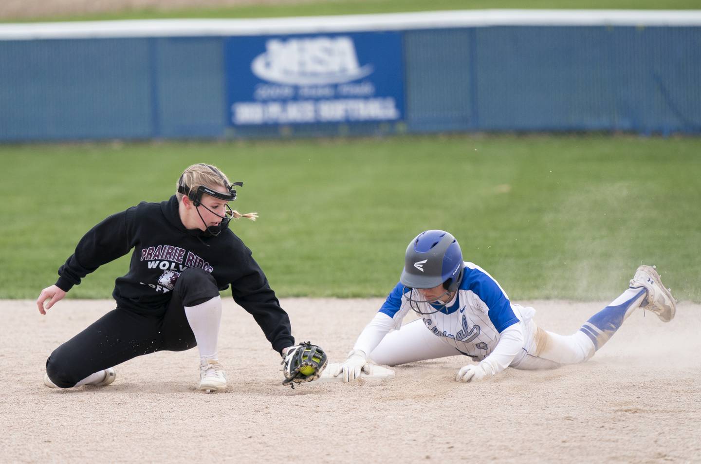 Burlington Central's Alyssa Becker slides in safe to 2nd base under the tag of Prairie Ridge's Adysen Kiddy during their game on Wednesday, April 27, 2022 at Burlington Central High School. Ryan Rayburn for Shaw Local
