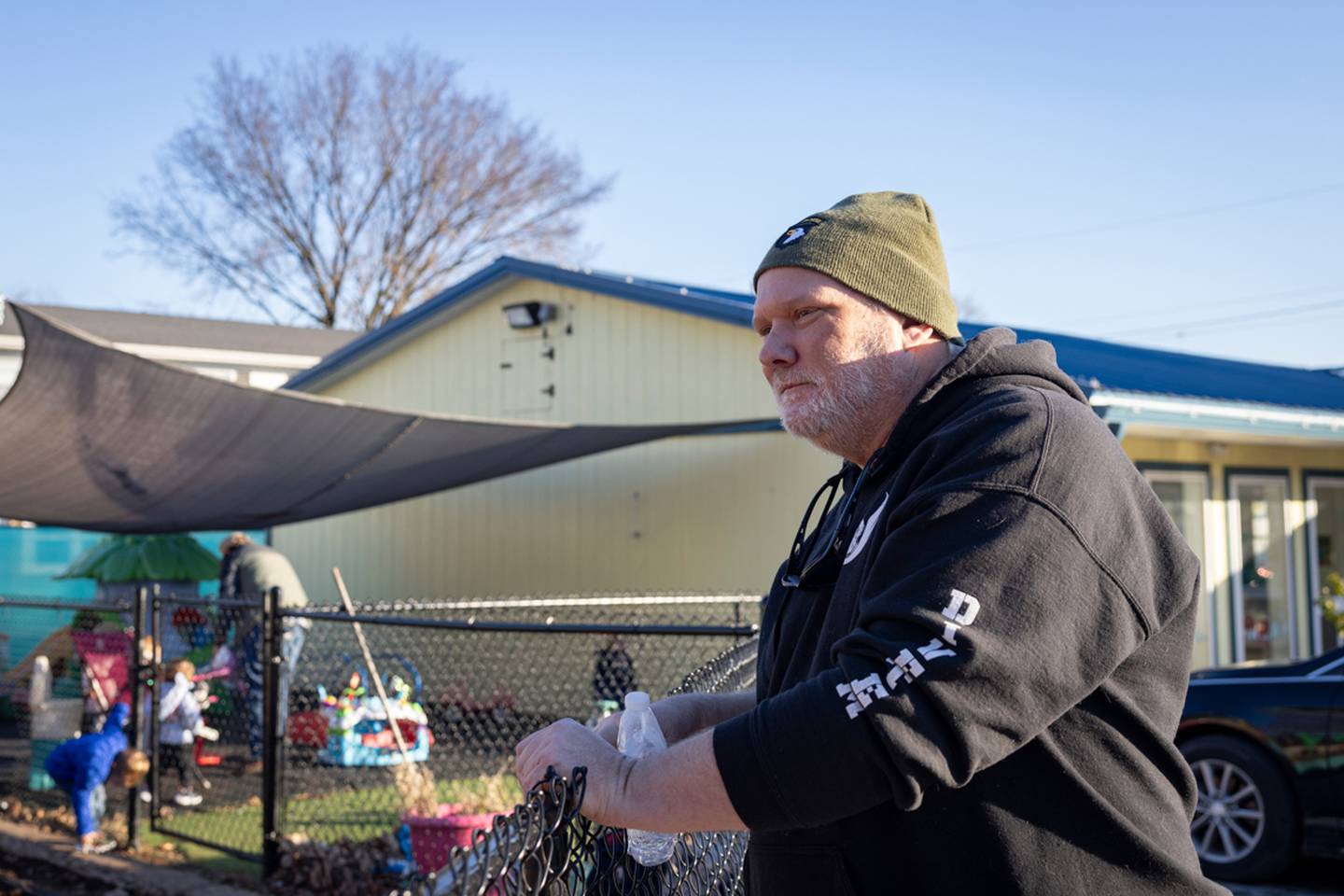 Stephen Casner watches children on the playground at OWL.