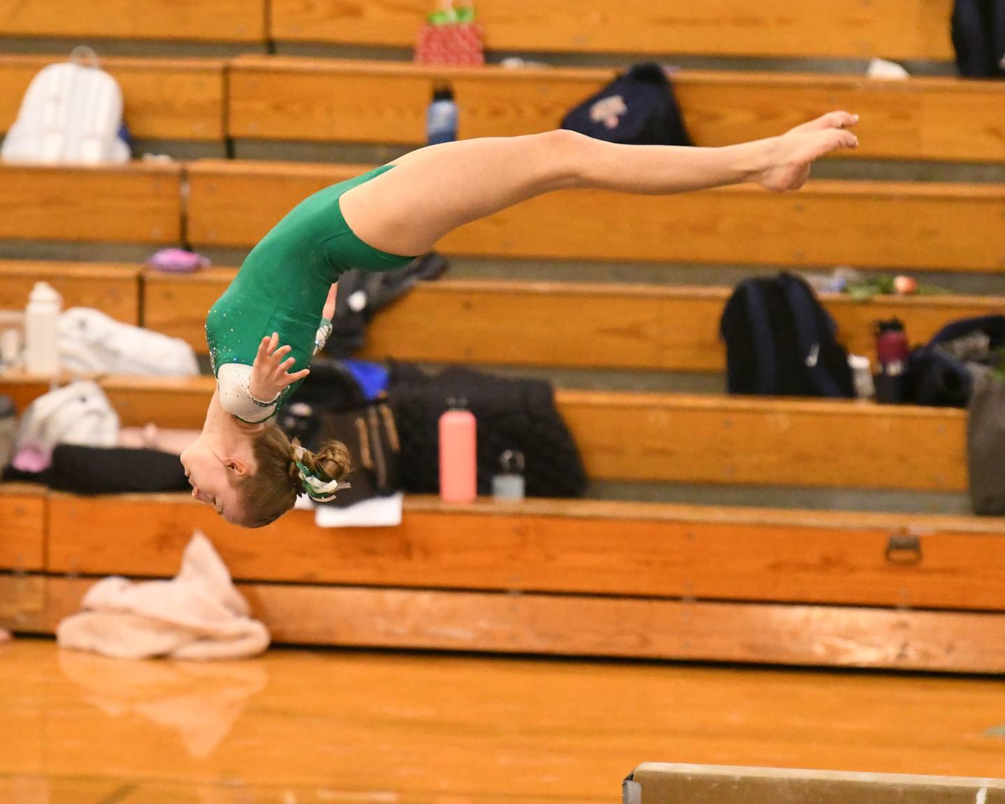 Melania Veselovsky of York High School finishes her beam routine during the conference meet held at Glenbard West on Saturday Jan. 27, 2024.