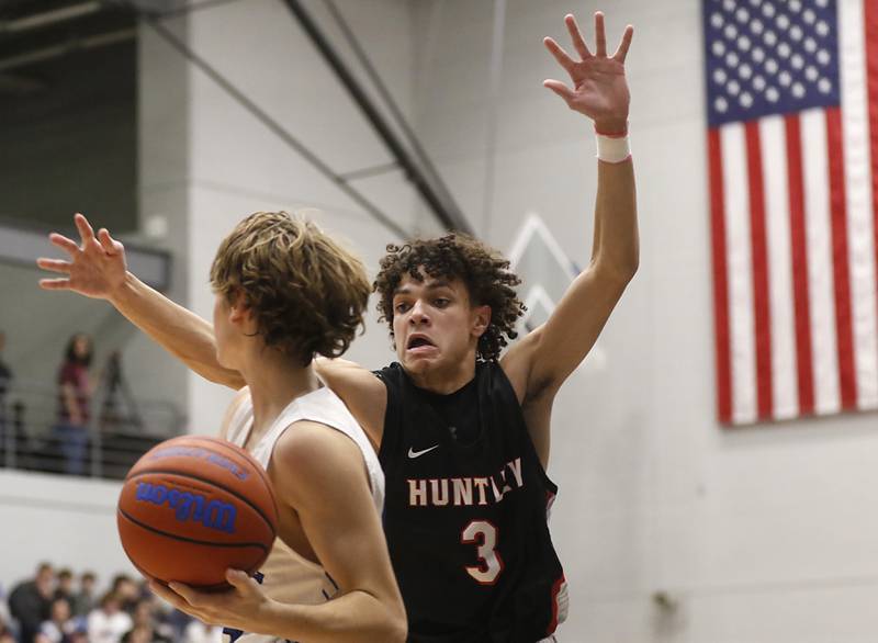 Huntley's Lucas Crosby pressures Burlington Central's Bennek Braden during a Fox Valley Conference boys basketball game on Friday, Dec. 15, 2023, at Burlington Central High School.