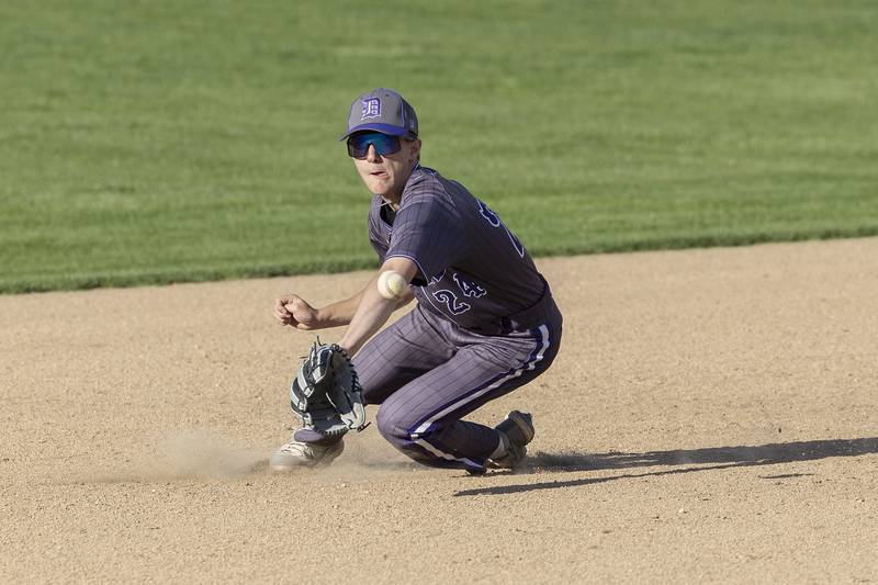 Dixon’s Brady Feit just misses on a sinking liner at shortstop against Rock Falls Tuesday, April 29, 2025.