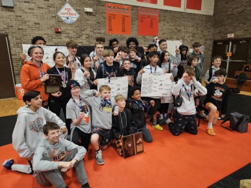 Members of the Huntley Middle School wrestling team celebrate their postseason success earlier this season. The JBarbs recently notched the 1,000th win in program history and will compete March 8-9 at the IESA State Tournament at the NIU Convocation Center.