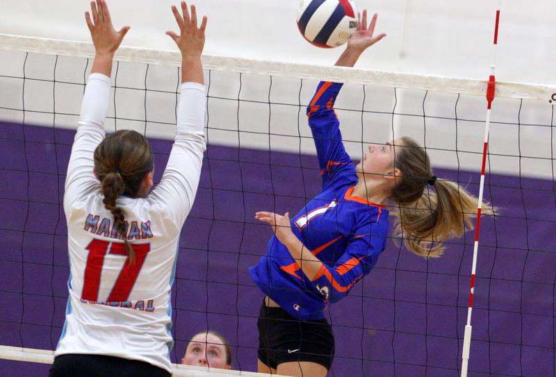 Genoa-Kingston’s Presley Meyer sends the ball against Marian Central in varsity volleyball tournament action on Saturday, Sept. 21, 2024, at Hampshire High School in Hampshire.