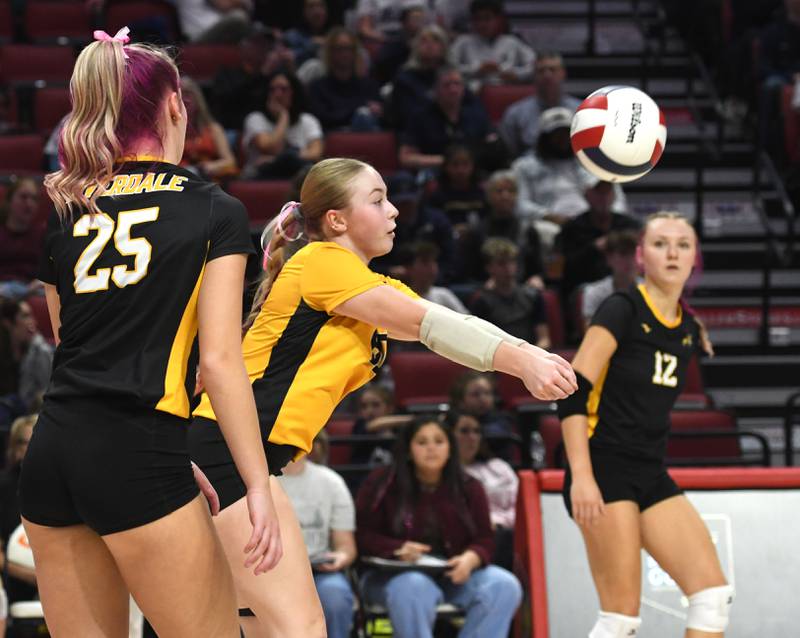 Riverdale's Kamryn Kruger (60) receives a serve during during the Rams' 2A semifinal match with Central Catholic at the state volleyball tournament at Illinois State University on Friday, Nov. 14, 2025.