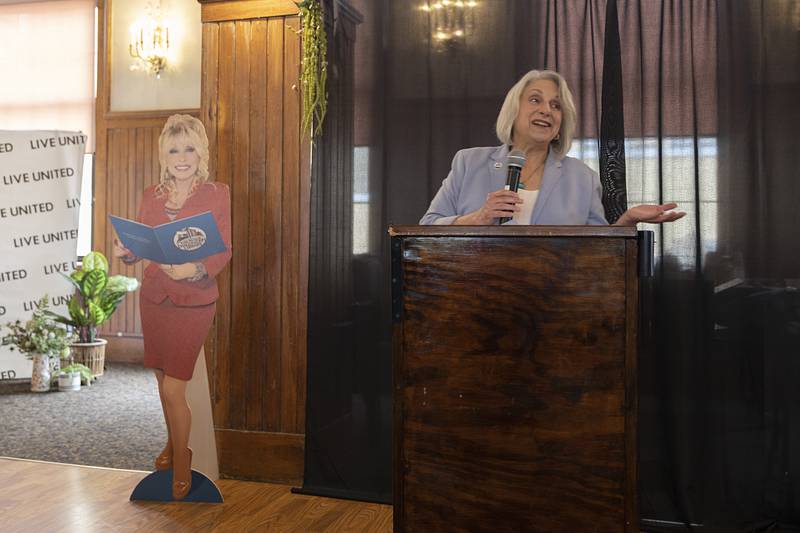 Andi Drileck, state director of Dolly Parton Imagination Library, speaks Tuesday, May 12, 2026, at the United Way of Lee County luncheon in Dixon. United Way has teamed up with the book-gifting program started by the country music star.