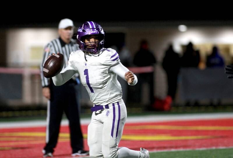 Collinsville quarterback Chase Reynolds looks to pass the ball during a Class 7A first-round game on Friday, Nov. 1, 2024 in Batavia.