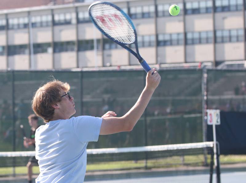 Ottawa's Landon Sin plays tennis against L-P at the Henderson-Guenther Tennis Facility on Monday, Monday, May 6, 2024 at Ottawa High School.