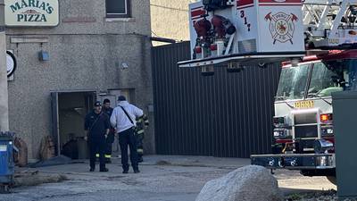Photos: Peru fire called to former downtown business