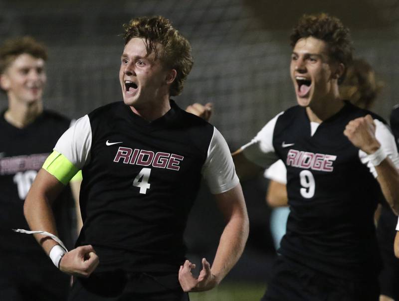 Prairie Ridge's Seth Matson celebrates his second goal with teammate, Prairie Ridge's Henry Knoll during the IHSA Boys Soccer 2A Grayslake Central Sectional semifinal match against Crystal Lake Central on Tuesday, Oct. 29, 2024, at Grayslake Central High School,