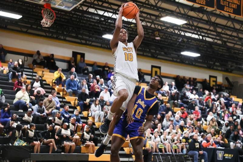 Joliet West’s Zion Gross goes up for the shot against Joliet Central on Tuesday, Dec. 3, 2024 in Joliet.