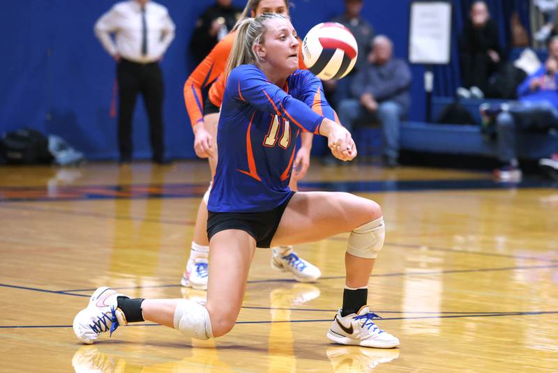 Genoa-Kingston's Alayna Pierce receives a IC Catholic Prep serve during their Class 2A sectional semifinal match Monday, Oct. 30, 2023, at Genoa-Kingston High School.