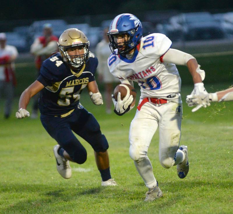 Polo's Estaban Salinas (54) chases a Bushnell-Prairie City player on Friday, Aug, 29, 2025 in 8-man action in Polo.