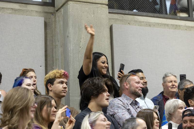 Loved ones wave to their graduates Friday, May 9, 2025, at Sauk Valley Community College’s commencement ceremony.