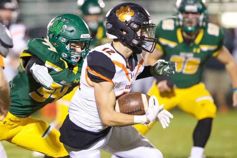 Crystal Lake Central's Rene Gaunaurd runs for a gain against Crystal Lake South on Friday Sept.30,2022 in Crystal Lake.