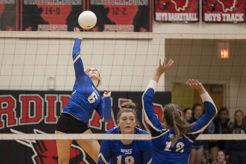 Newman’s Jess Johns hammers a shot in the semifinal sectional game Monday, Oct. 31, 2022 against Newark.
