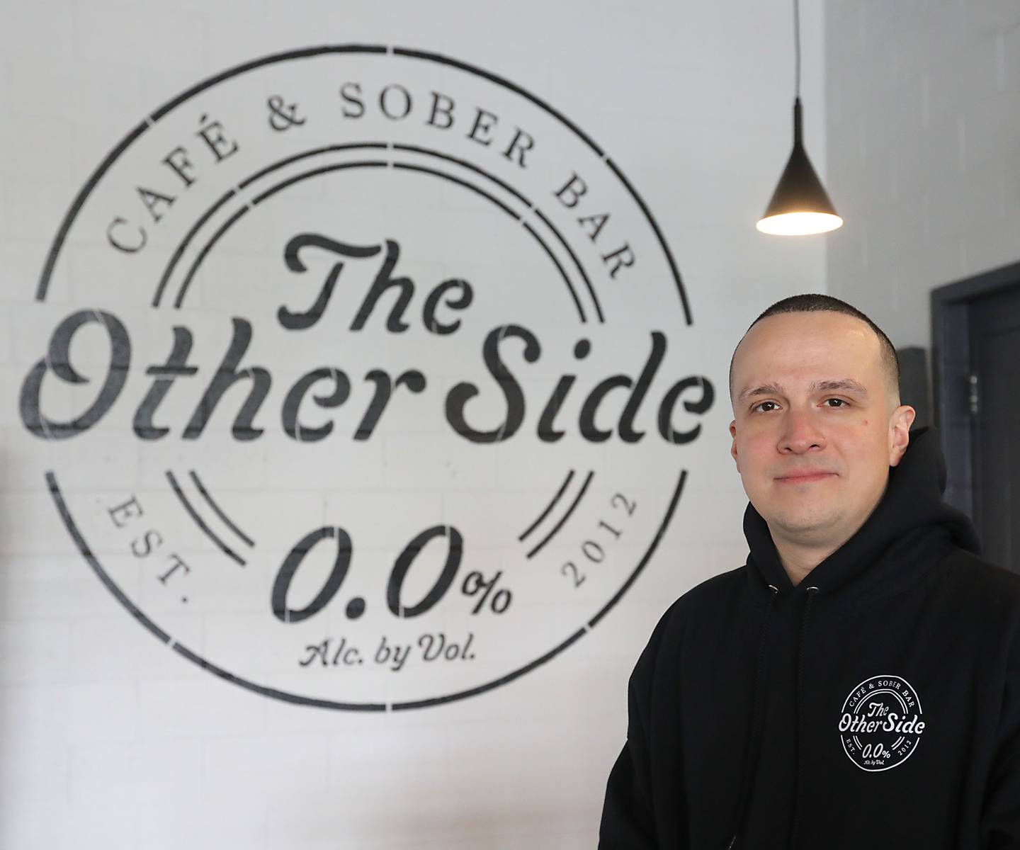 New Directions case manager Joe Ledesma on Wednesday, May 6, 2026, at the Other Side sober bar, in Crystal Lake. Ledesma started a new recovery group on Saturdays at the sober bar. The recovery group uses Buddhist ideologies to help overcome addiction.