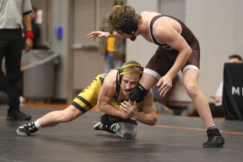 Joliet West’s Coehn Webber brings down Joliet Catholic’s Dawson Mack in the Class 3A Minooka Regional 150 pound championship on Saturday, Jan. 31, 2026 in Minooka.