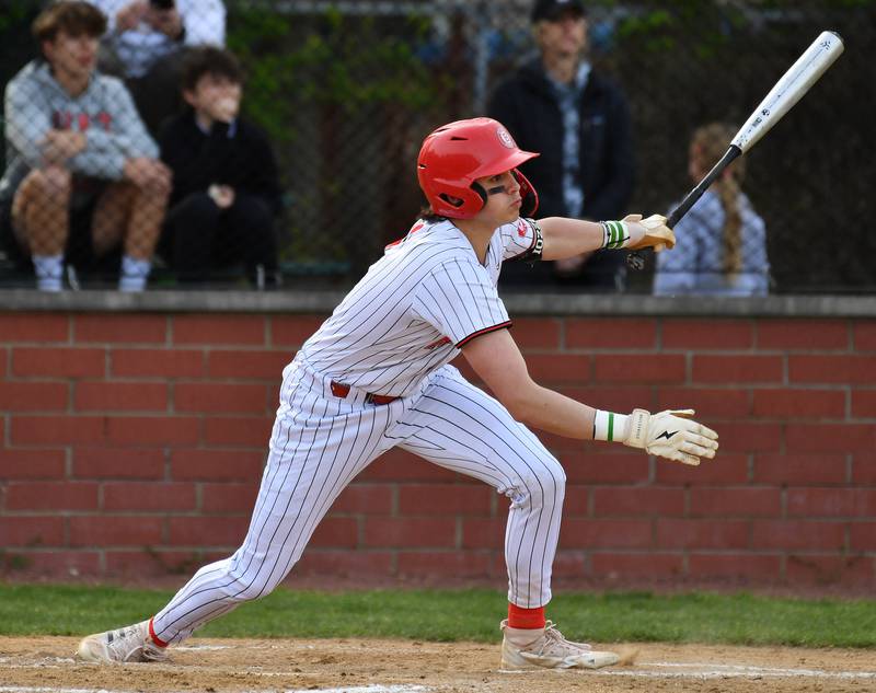 Benet's Marc Iozzo watches his line drive get caught by the Nazareth second baseman during a game on April 22, 2024 at Benet Academy in Lisle.