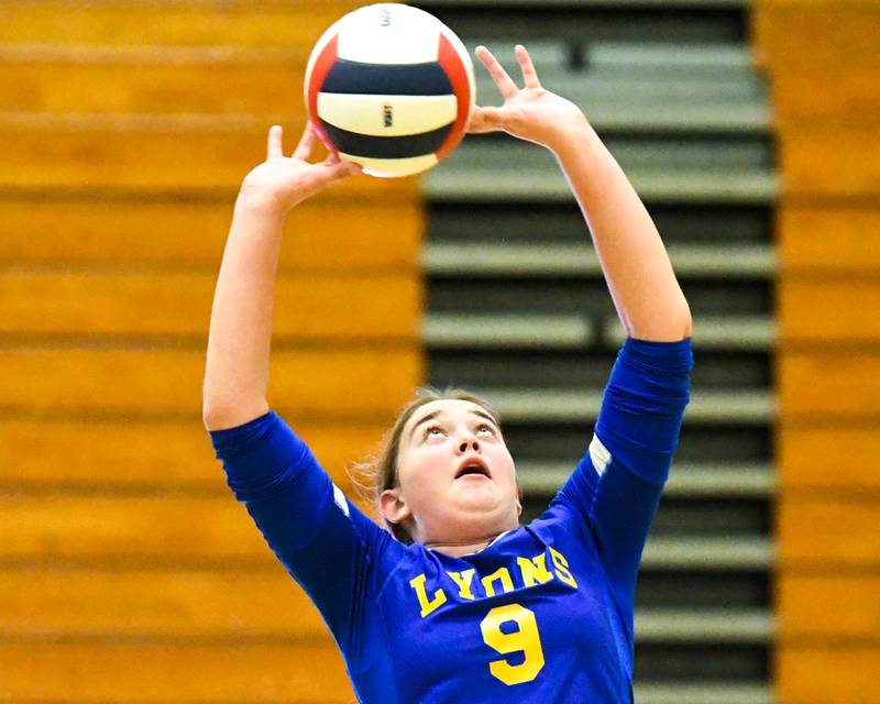 Lyons Township's Colleen Chambers (9) sets the ball during the regional title game against York on Thursday Oct. 30, 2025, held at York High School.