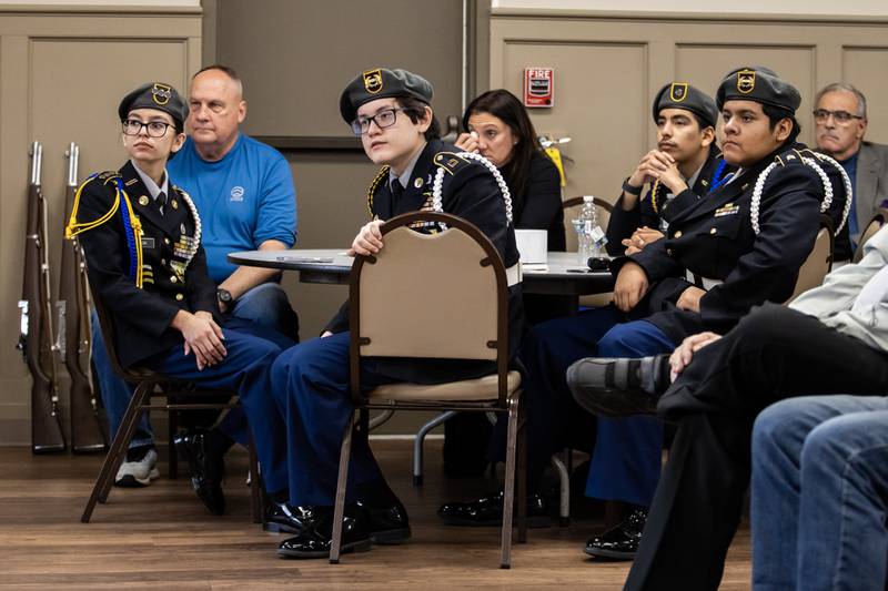 Members a Joliet Central’s JROTC listen to speakers during a Veterans Day ceremony at American Legion Post 1080 in Joliet on Nov. 11, 2025.