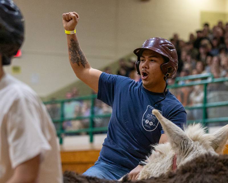 Seneca Firefighter reacts to made shot in game of Donkey Basketball on Saturday, Feb. 7, 2026 at Seneca High School West Campus in Seneca.