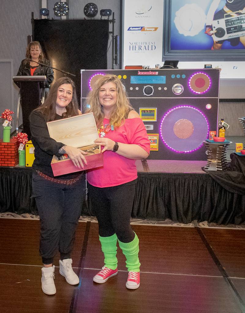 Revelers celebrate an earlier era at the McHenry Area Chamber's 2024 Gala, "Boombox Ball: A Totally Tubular '80s Party," on Jan. 27.