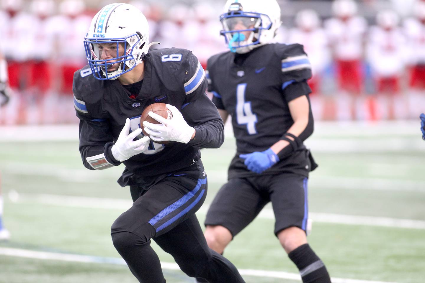 St. Charles North's Drew Surges (6) runs the ball in for a touchdown during their 7A quarterfinal game against St. Rita in St. Charles on Saturday, Nov. 12, 2022.