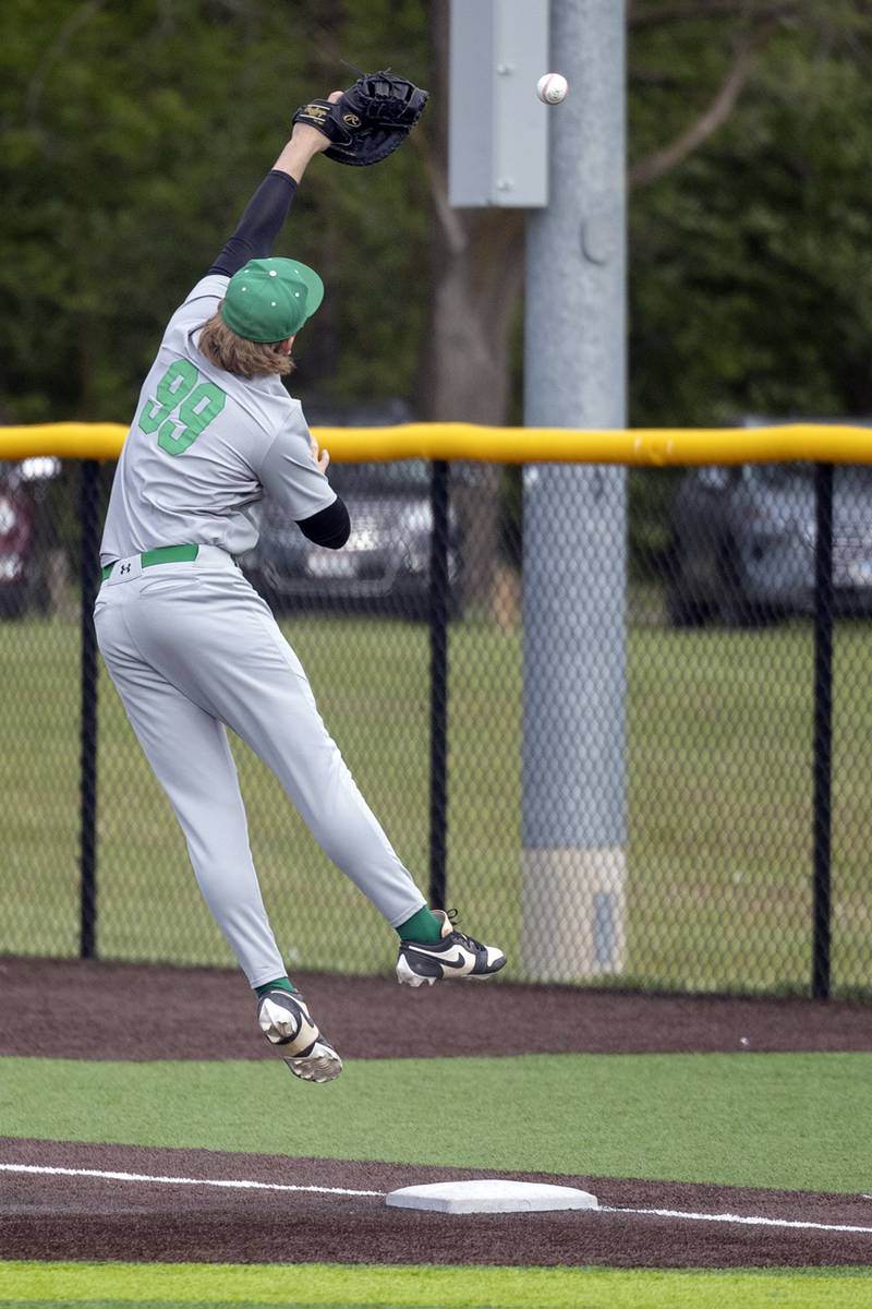 Geneseo’s Kale Whitaker leaps but comes up short on a throwing error against Sterling Wednesday, May 6, 2026.