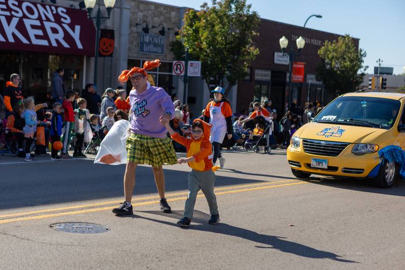 IBPS swim school walks in the Sycamore Pumpkin Festival parade  on Sunday Oct. 26,2025 in Sycamore.