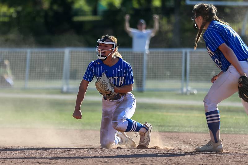 St Charles North's Ginger Ritter (8) celebrates fielding the last out to defeat Glenbard North in the Class 4A Glenbard West Regional Final softball game.  May 26, 2023.