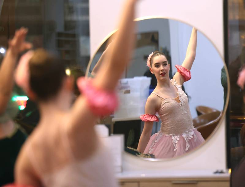 Dancers from the Beth Fowler School of Dance perform in MC Beauty Salon and Spa Friday, Nov. 21, 2025, during Moonlight Magic in downtown Sycamore.
