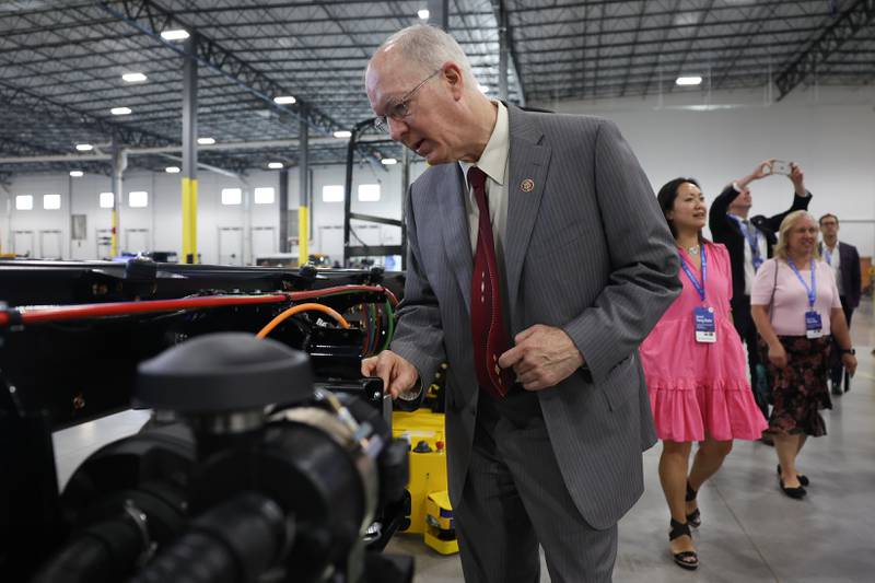 U.S. Representative Bill Foster, D-11, looks over equipment during a tour of the Lion Electric manufacturing facility on Friday, July 21st, 2023 in Joliet.