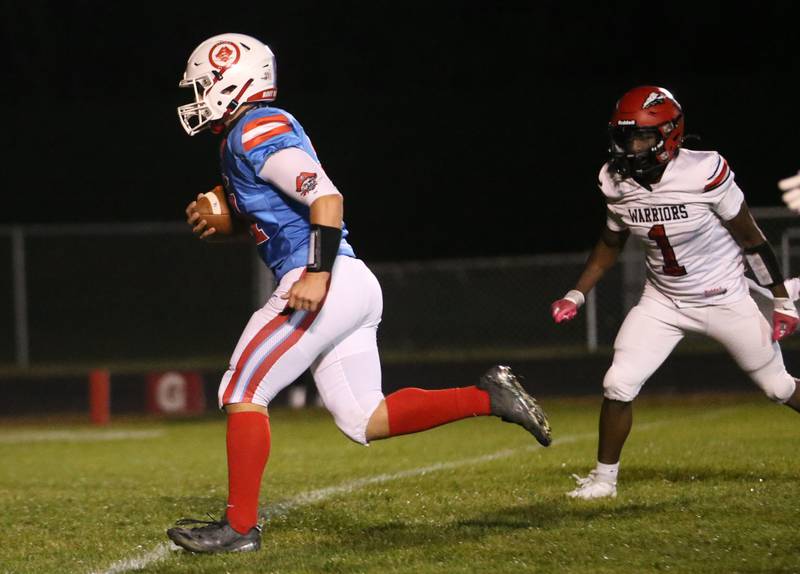 Ottawa's Wes Weatherford runs in all alone to score the teams first touchdown against Granite City on Friday, Oct. 24, 2025 on Kingman Field at Ottawa High School.