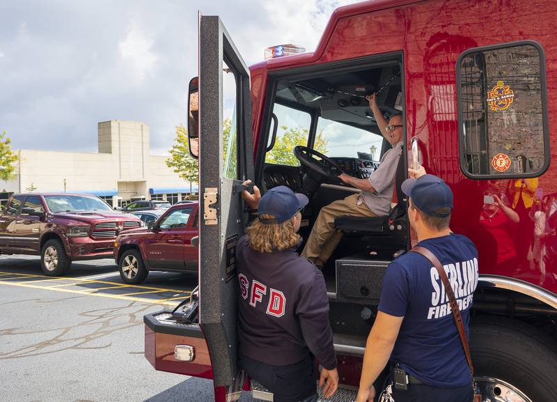 Merlin fires up the horn on the firetruck Sunday, Sept. 17, 2023.