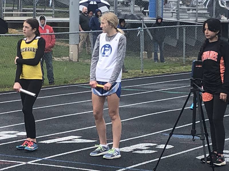 Princeton's Devin Dever awaits the start of the 4x800 relay in Thursday's Three Rivers Track & Field Meet at Bureau Valley High School.