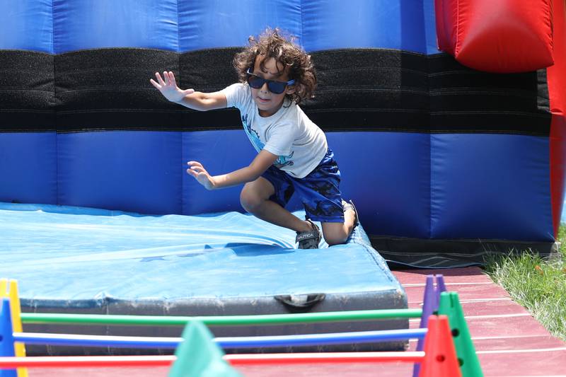 Adon Campos, 5-yeas old, runs the obstacle course at Bolingbrook’s annual International Fest on Saturday, July 15th, 2023.