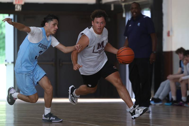 Morris’ Colin Pfeifer takes the ball up-court against Plainfield South at the 37th Morris Boys Shootout on Tuesday, June 25, 2024.