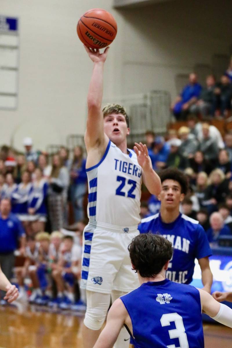 Princeton's Evan Driscoll takes aim against Newman Tuesday at Prouty Gym. The Tigers won 59-54.