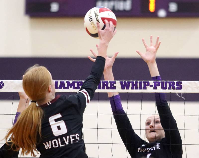 Hampshire’s Elizabeth King, right, blocks against Prairie Ridge’s Sonora Bekere in varsity girls volleyball at Hampshire High School in Hampshire on Tuesday, Sept. 2, 2025.
