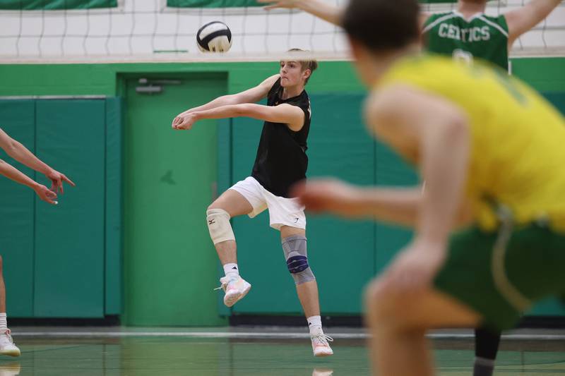 Joliet West’s Connor Herre receives the serve against Providence on Tuesday, April 16, 2024 in New Lenox.