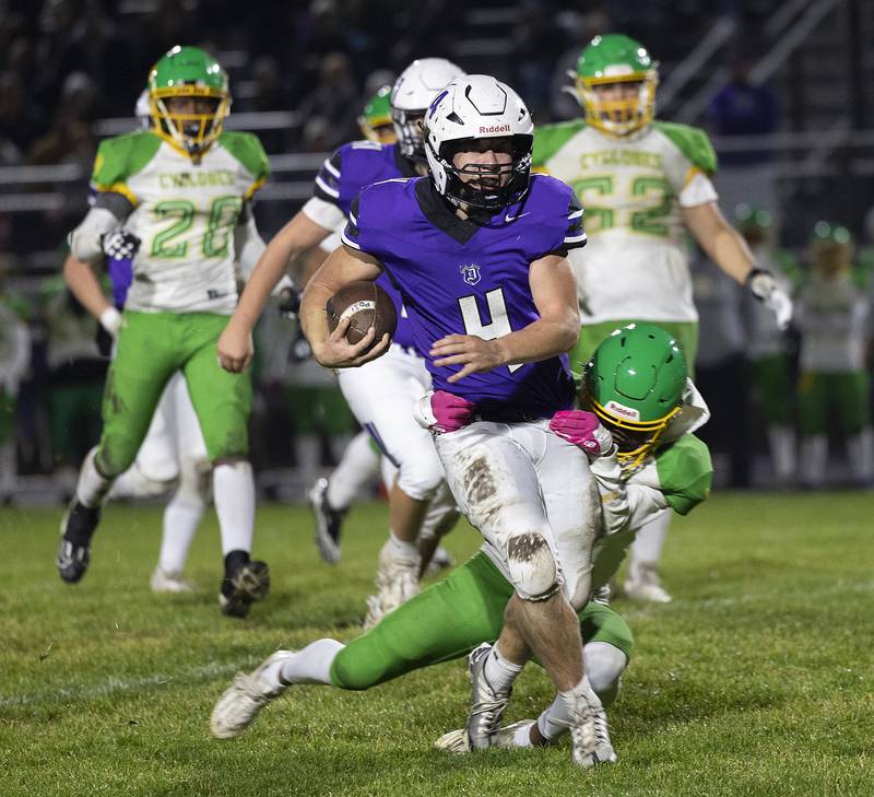 Dixon’s Landon Knigge picks up yards Friday, Nov. 8, 2024 in the second round of the Class 4A football playoffs.